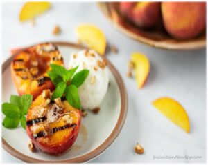 Grilled Peaches with Cream and Pecan Brittle